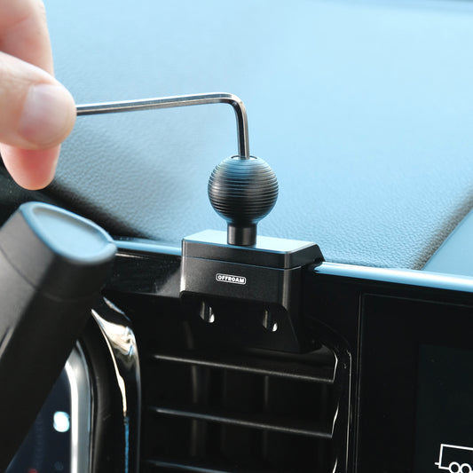 Image of Offroam Mounting Base installed securely in Chevrolet Silverado 2022-2025 | Silverado HD 2024-2025 and GMC Sierra 1500 2022-2025 | Sierra HD 2024-2025 with 13.4-in. display. This premium all metal phone mounting base installs easily without drilling or glue. Perfect placement without blocking screens, driver view, or air flow.