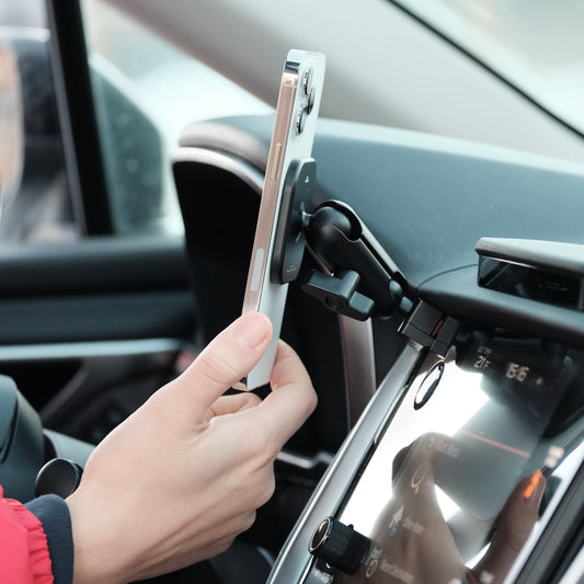 Image of Offroam MagSafe-compatible Phone Mount installed securely in Subaru Outback | Legacy 2020-2025. This premium phone mount installs easily without drilling or glue. High force magnets hold phone on any trail, road, or track. Perfect placement without blocking screens, driver view, or air flow. Fully adjustable positioning.