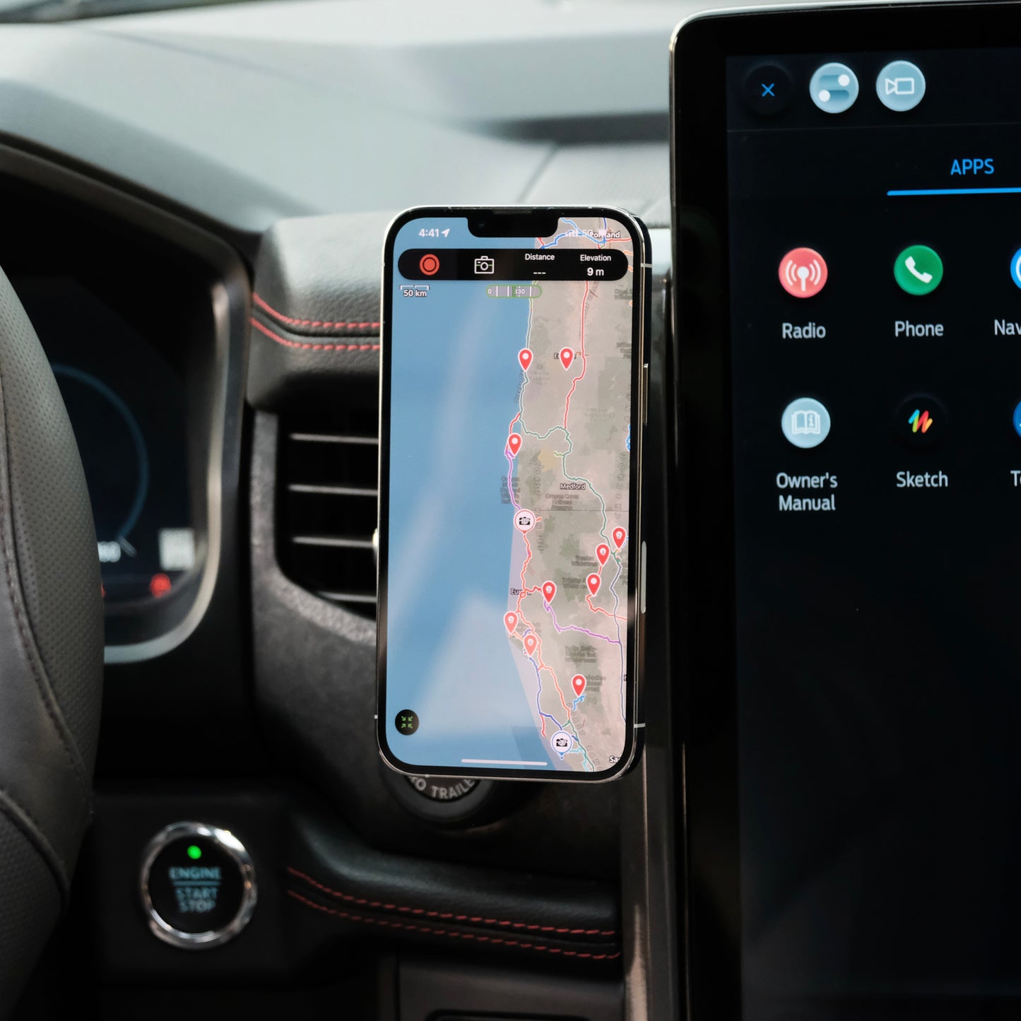 Image of Offroam MagSafe-compatible Phone Mount installed securely in Ford F-150 Lightning 2022-2025 (Lariat & Platinum) | Ford Expedition 2022-2024. This premium phone mount installs easily without drilling or glue. High force magnets hold phone on any trail, road, or track. Perfect placement without blocking screens, driver view, or air flow. Fully adjustable positioning.