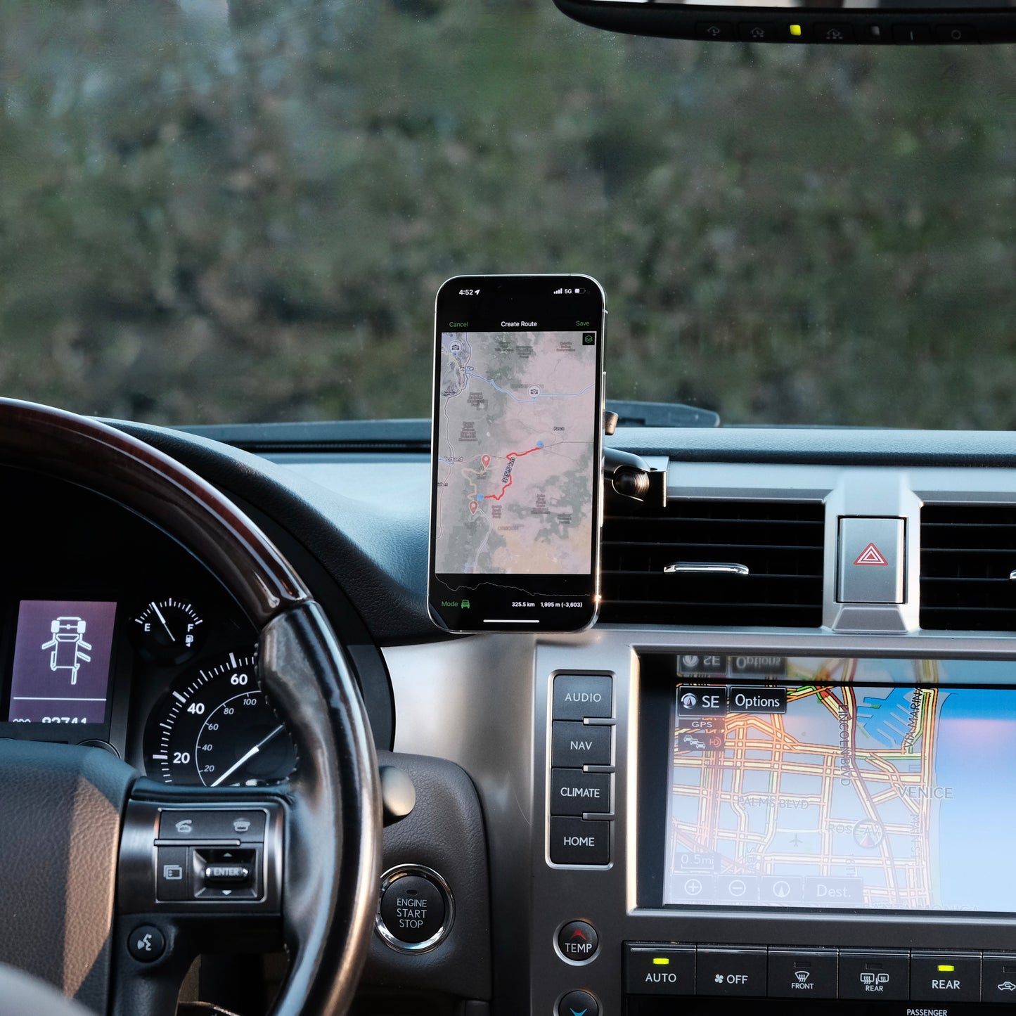 Image of Offroam MagSafe-compatible Phone Mount installed securely in Lexus GX460 2010-2021. This premium phone mount installs easily without drilling or glue. High force magnets hold phone on any trail, road, or track. Perfect placement without blocking screens, driver view, or air flow. Fully adjustable positioning.