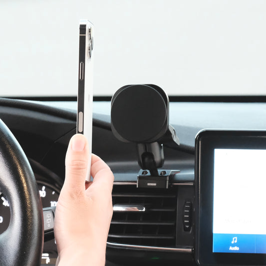 Image of Offroam MagSafe-compatible Phone Mount installed securely in Ford Explorer 2020-2024. This premium phone mount installs easily without drilling or glue. High force magnets hold phone on any trail, road, or track. Perfect placement without blocking screens, driver view, or air flow. Fully adjustable positioning.