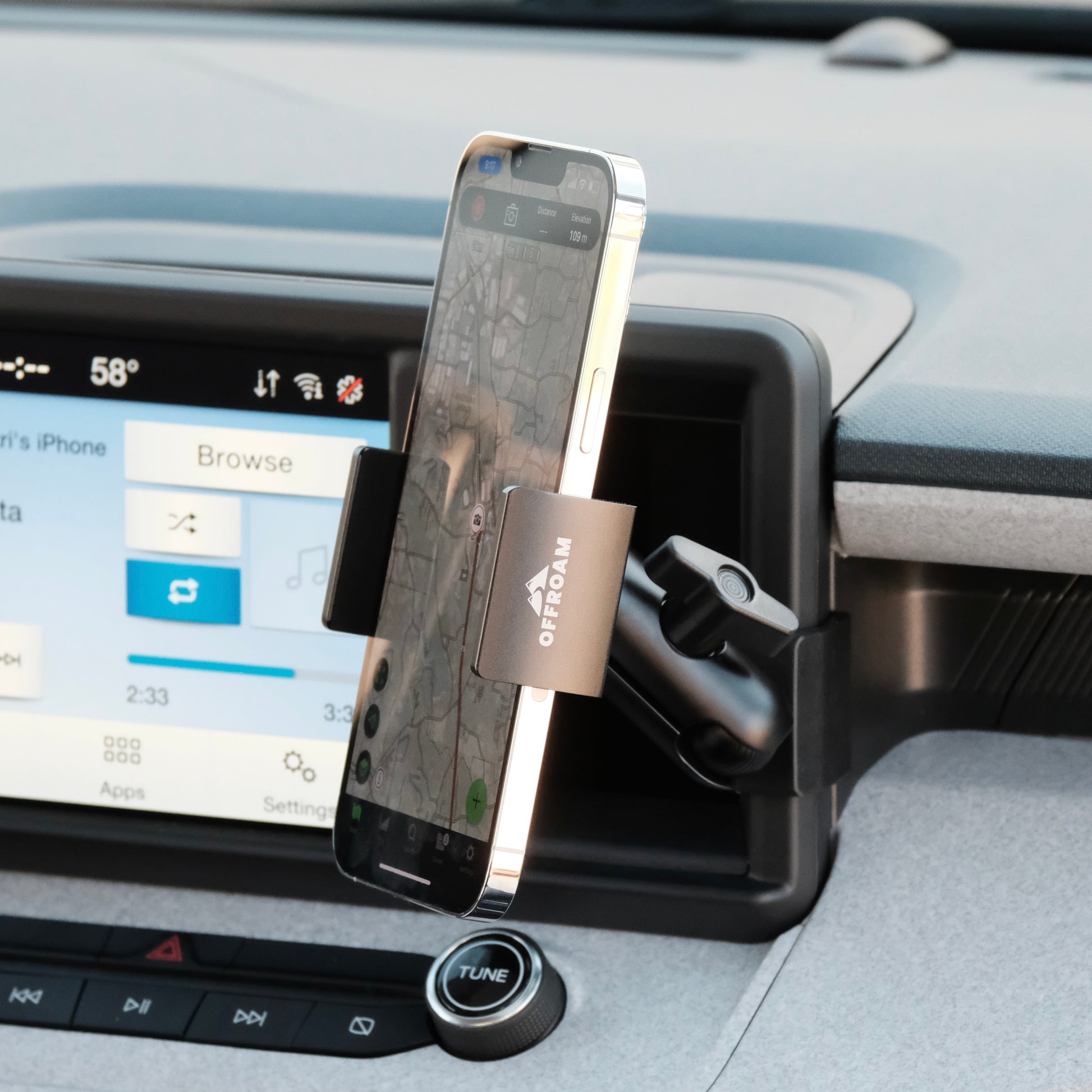 Image of Offroam Phone Mount installed securely in Ford Maverick 2022-2024. This premium phone mount installs easily without drilling or glue. Spring loaded Universal holder for use with any phone. Perfect placement without blocking screens, driver view, or air flow. Fully adjustable positioning.