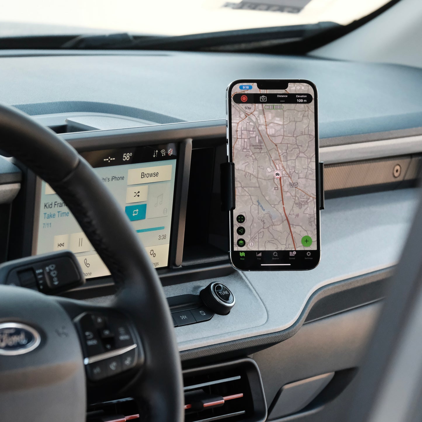 Image of Offroam Phone Mount installed securely in Ford Maverick 2022-2024. This premium phone mount installs easily without drilling or glue. Spring loaded Universal holder for use with any phone. Perfect placement without blocking screens, driver view, or air flow. Fully adjustable positioning.