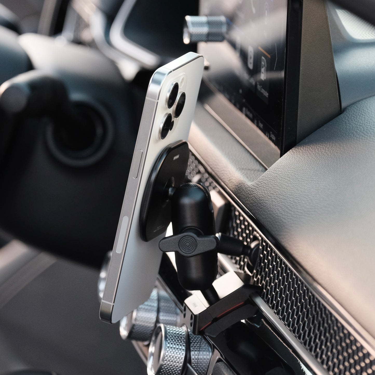 Image of Offroam MagSafe-compatible Phone Mount installed securely in Honda Civic 2022-2026 | CR-V 2023-2026. This premium phone mount installs easily without drilling or glue. High force magnets hold phone on any trail, road, or track. Perfect placement without blocking screens, driver view, or air flow. Fully adjustable positioning.