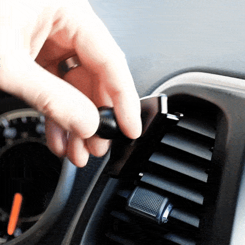 An animation showing quick and easy installation and function off Offroam Qi2 charging phone mount installed in a jeep Cherokee 2014 to 2018 model years. Easy installation, fully articulating, louvers, fast, charging capability and secure magnet attachment via MagSafe magnets
