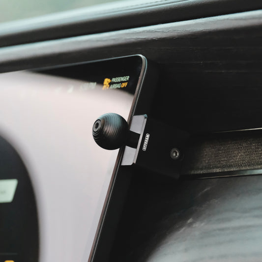 Image of Offroam Mounting Base installed securely in Rivian R1T | R1S 2022-2025. This premium all metal phone mounting base installs easily without drilling or glue. Perfect placement without blocking screens, driver view, or air flow.