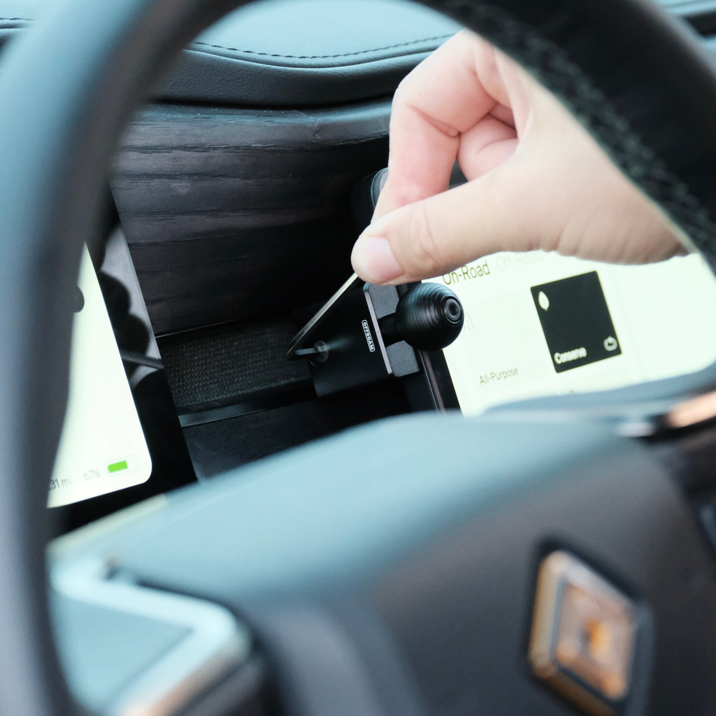 Image of Offroam Mounting Base installed securely in Rivian R1T | R1S 2022-2025. This premium all metal phone mounting base installs easily without drilling or glue. Perfect placement without blocking screens, driver view, or air flow.
