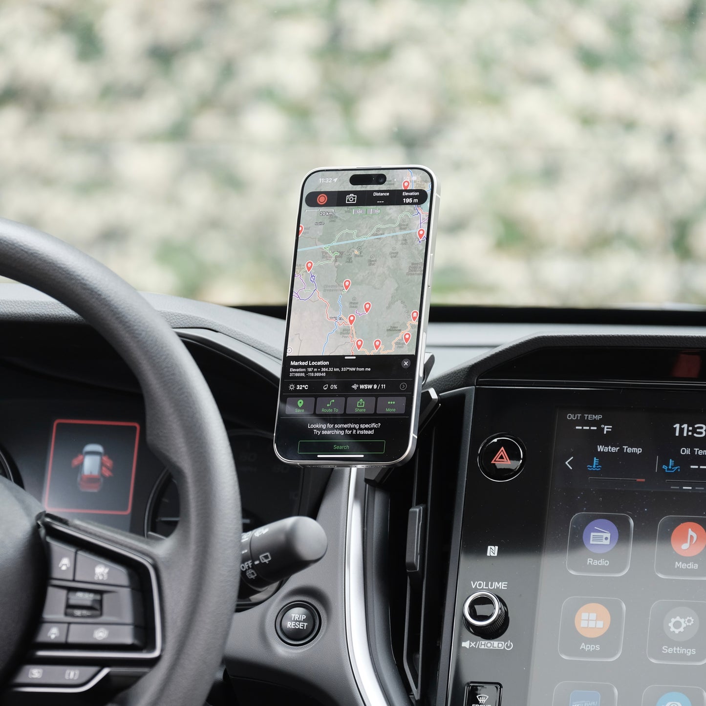 Offroam phone holder in Subaru Crosstrek 2024-2025, Forester 2025, WRX 2022-2024, securely holding a MagSafe phone with ultra-strong magnets, adjustable 360-degree swivel arm, and rugged all-metal construction, positioned in a perfect spot without blocking the view, controls, or airflow.