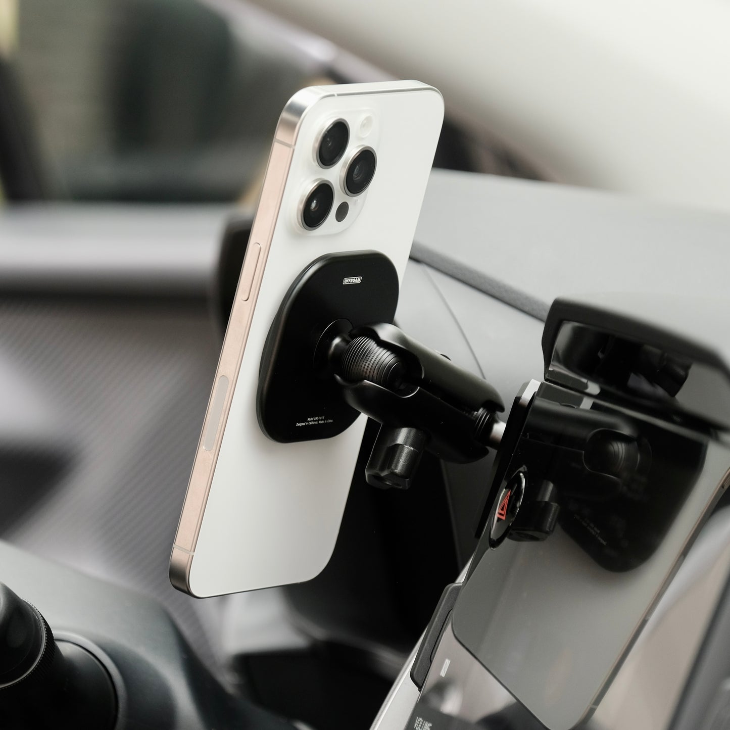 Offroam phone holder in Subaru Crosstrek 2024-2025, Forester 2025, WRX 2022-2024, securely holding a MagSafe phone with ultra-strong magnets, adjustable 360-degree swivel arm, and rugged all-metal construction, positioned in a perfect spot without blocking the view, controls, or airflow.