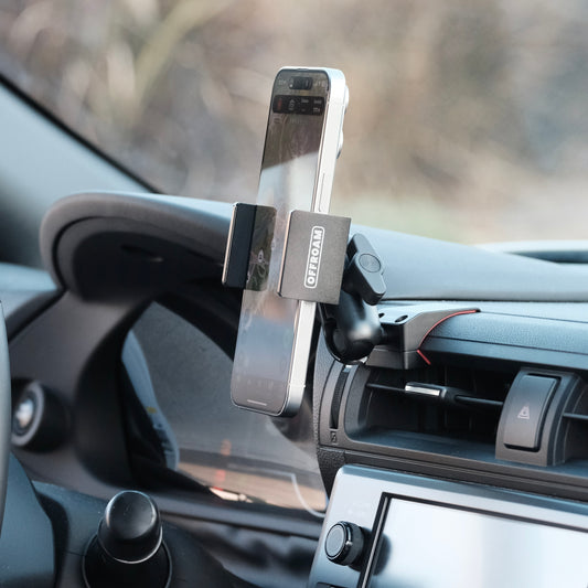 Image of Offroam Phone Mount installed securely in Subaru BRZ 2022-2026 | Toyota GR86 2022-2026. This premium phone mount installs easily without drilling or glue. Spring loaded Universal holder for use with any phone. Perfect placement without blocking screens, driver view, or air flow. Fully adjustable positioning.