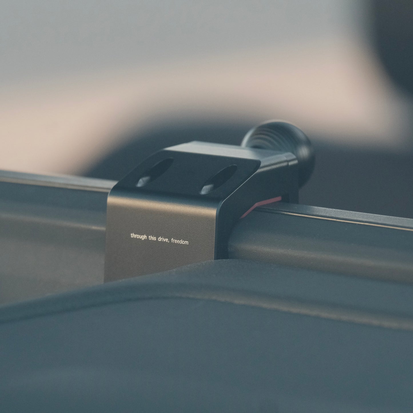 Image of Offroam Mounting Base installed securely in Toyota Land Cruiser 250 2024-2026. This premium all metal phone mounting base installs easily without drilling or glue. Perfect placement without blocking screens, driver view, or air flow.