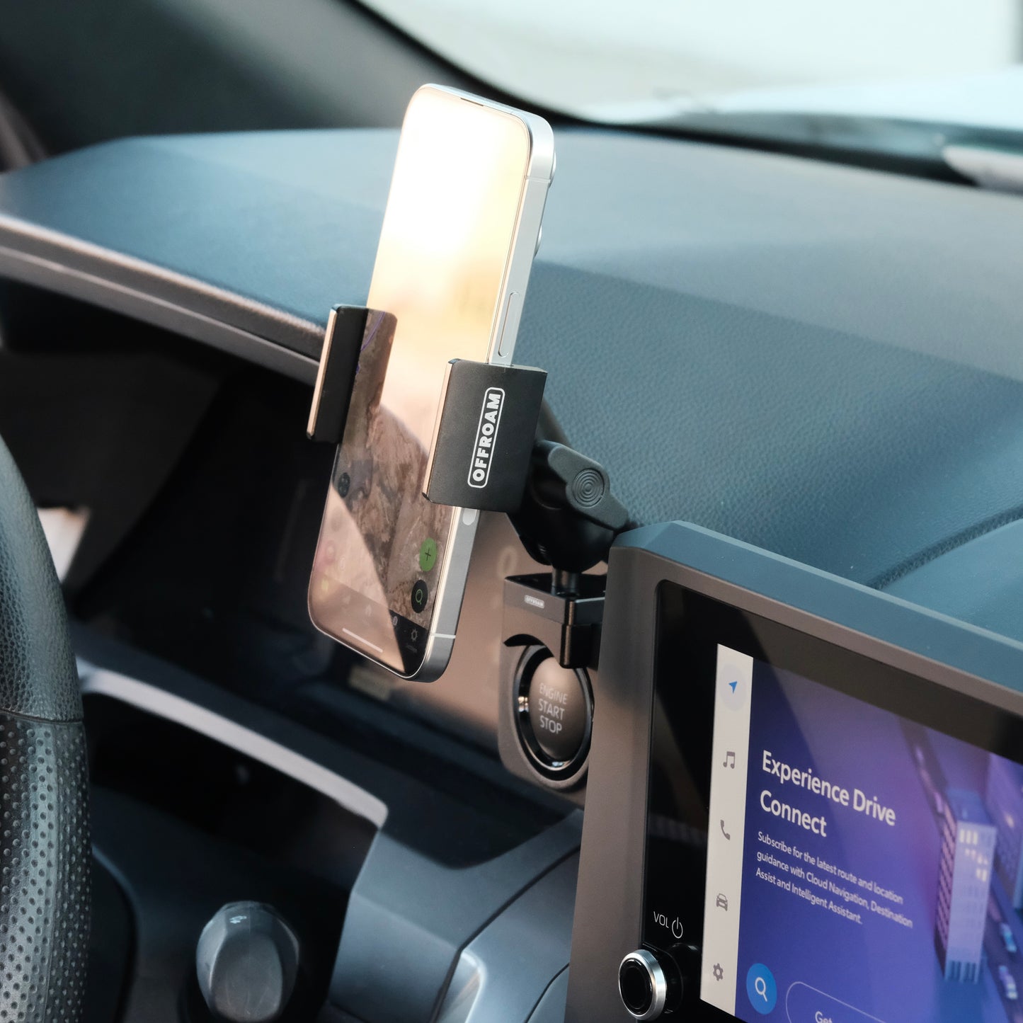 Image of Offroam Phone Mount installed securely in Toyota Tacoma 2024-2025 | 4Runner 2025. This premium phone mount installs easily without drilling or glue. Spring loaded Universal holder for use with any phone. Perfect placement without blocking screens, driver view, or air flow. Fully adjustable positioning.
