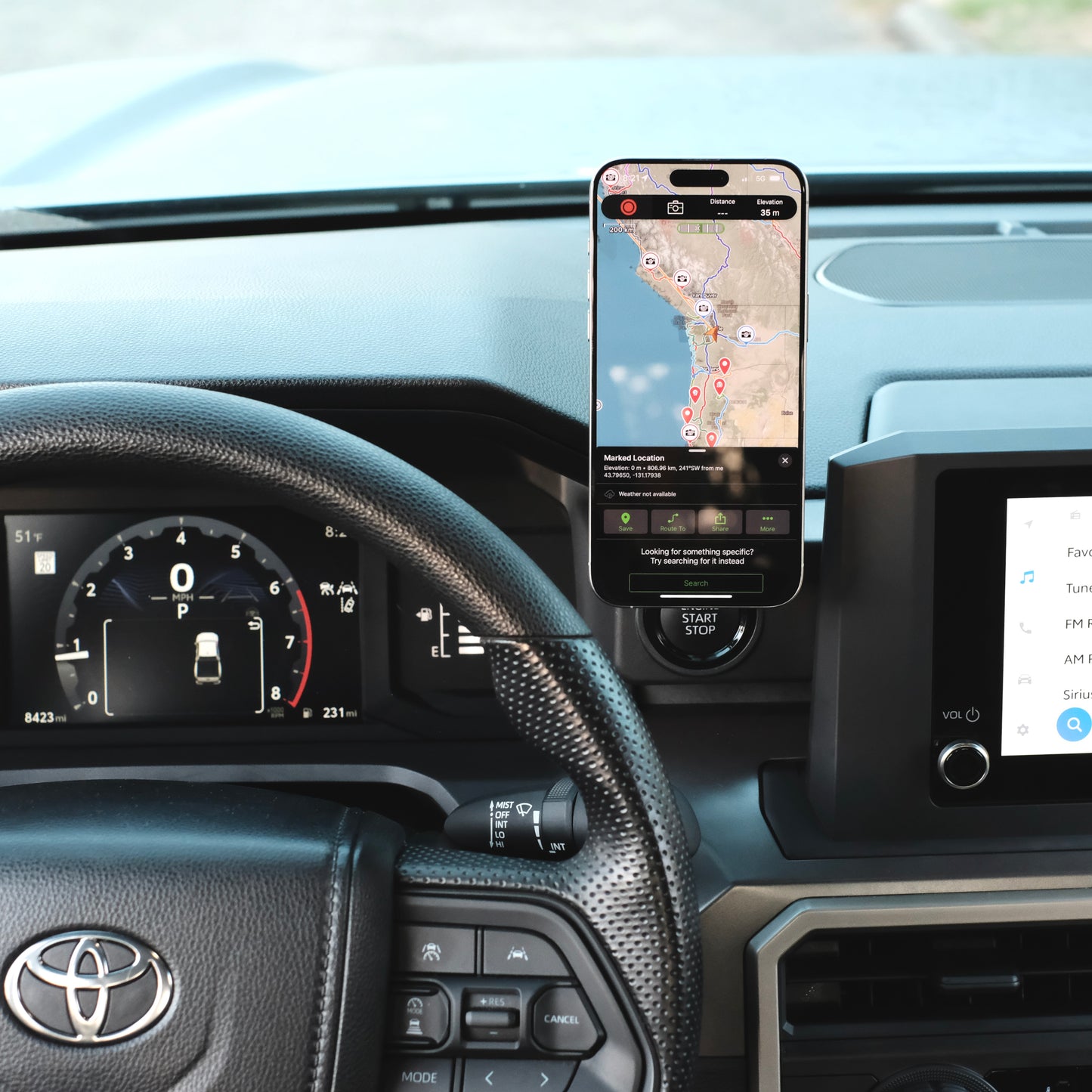 Image of Offroam MagSafe-compatible Phone Mount installed securely in Toyota Tacoma 2024-2025 | 4Runner 2025. This premium phone mount installs easily without drilling or glue. High force magnets hold phone on any trail, road, or track. Perfect placement without blocking screens, driver view, or air flow. Fully adjustable positioning.
