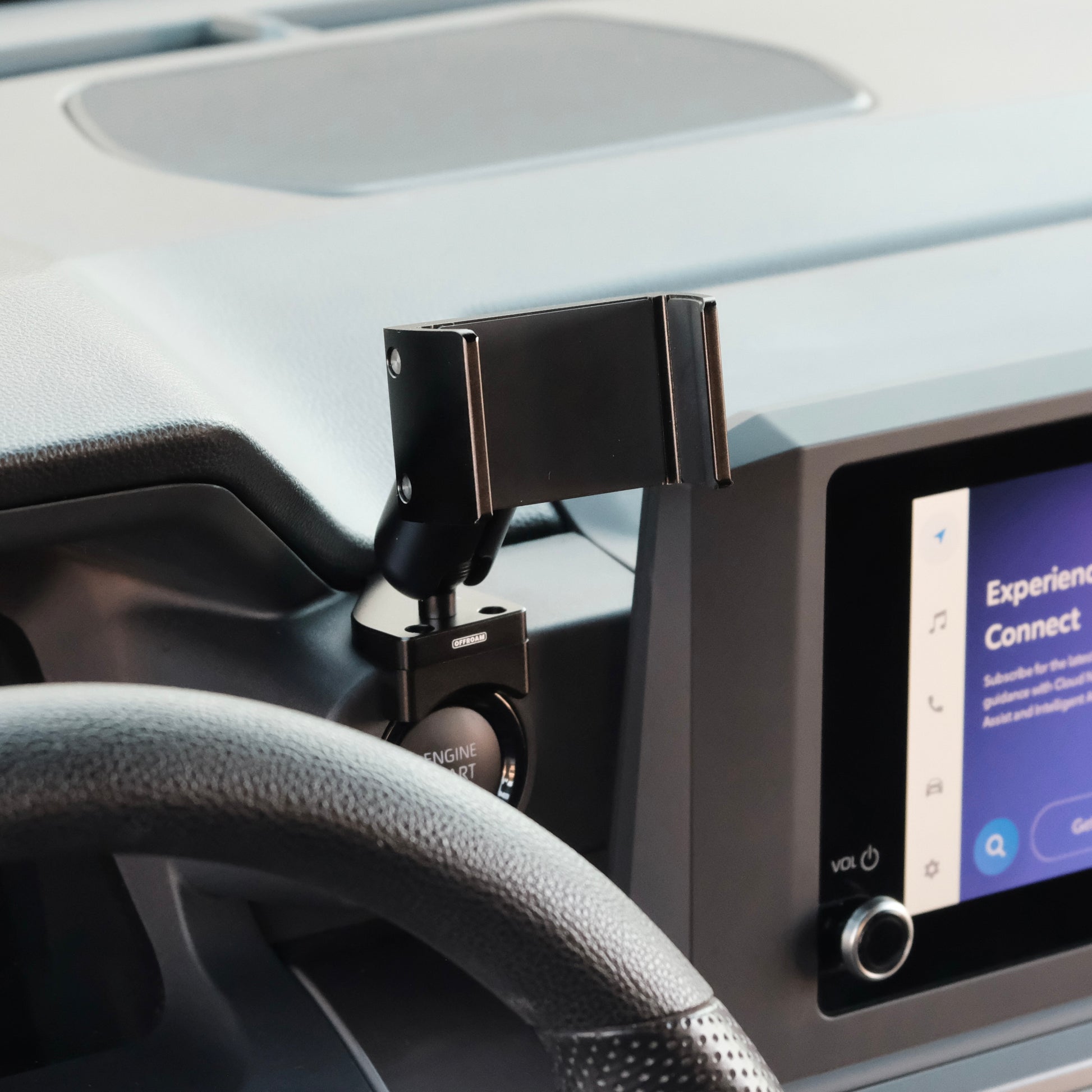 Image of Offroam Phone Mount installed securely in Toyota Tacoma 2024-2025 | 4Runner 2025. This premium phone mount installs easily without drilling or glue. Spring loaded Universal holder for use with any phone. Perfect placement without blocking screens, driver view, or air flow. Fully adjustable positioning.