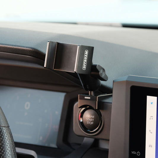 Image of Offroam Phone Mount installed securely in Toyota Tacoma 2024-2025 | 4Runner 2025. This premium phone mount installs easily without drilling or glue. Spring loaded Universal holder for use with any phone. Perfect placement without blocking screens, driver view, or air flow. Fully adjustable positioning.