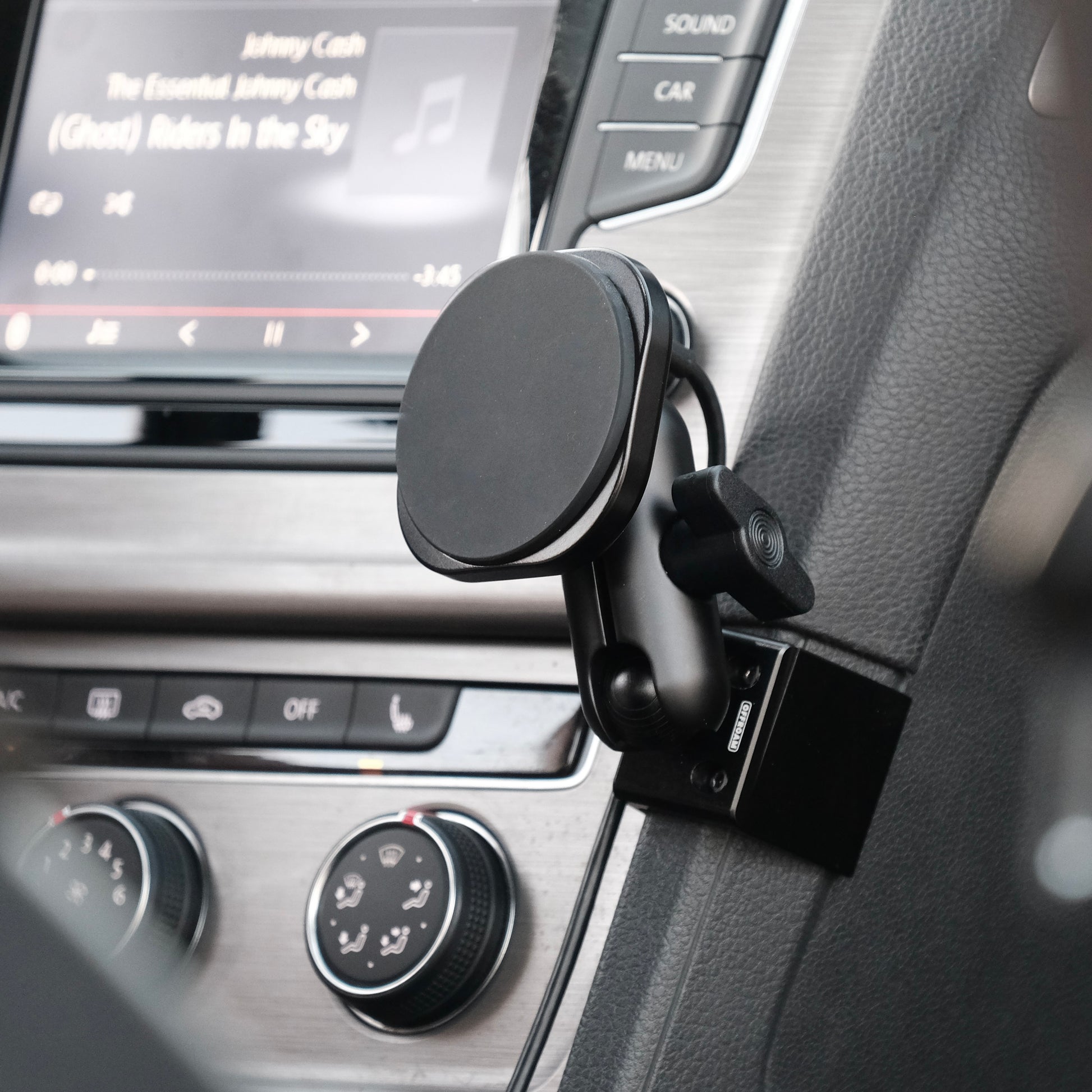 MagSafe-compatible Qi2 phone mount installed in a 2015–2021 Volkswagen Golf dashboard, showing clean, integrated look without a phone attached.