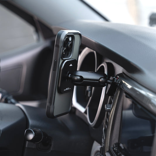 Image of Offroam MagSafe-compatible Phone Mount installed securely in Toyota 4Runner 2003-2009. This premium phone mount installs easily without drilling or glue. High force magnets hold phone on any trail, road, or track. Perfect placement without blocking screens, driver view, or air flow. Fully adjustable positioning.