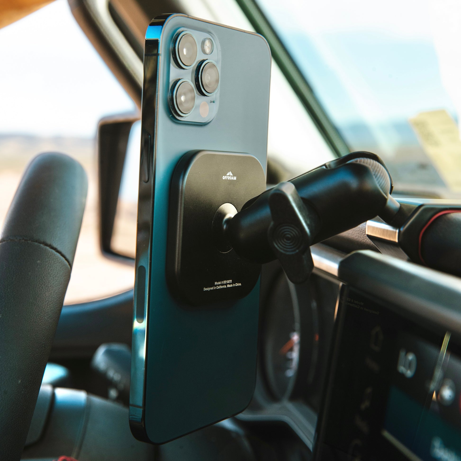 Image of Offroam MagSafe-compatible Phone Mount installed securely in Jeep Wrangler | Gladiator 2024-2025. This premium phone mount installs easily without drilling or glue. High force magnets hold phone on any trail, road, or track. Perfect placement without blocking screens, driver view, or air flow. Fully adjustable positioning.