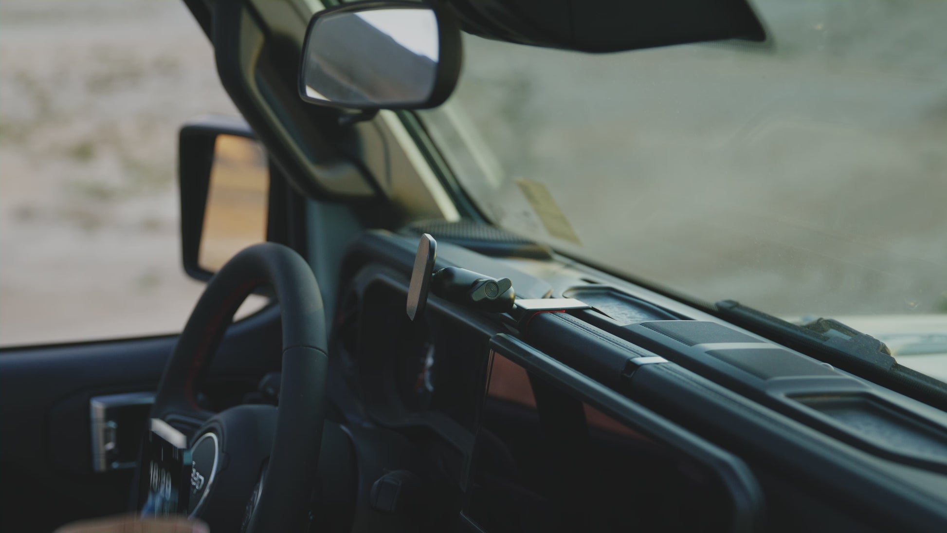 Video of Offroam MagSafe-compatible Phone Mount for Jeep Wrangler | Gladiator 2024-2025. This premium phone mount installs easily without drilling or glue. High force magnets hold phone on any trail, road, or track. Perfect placement without blocking screens, driver view, or air flow. Fully adjustable positioning.