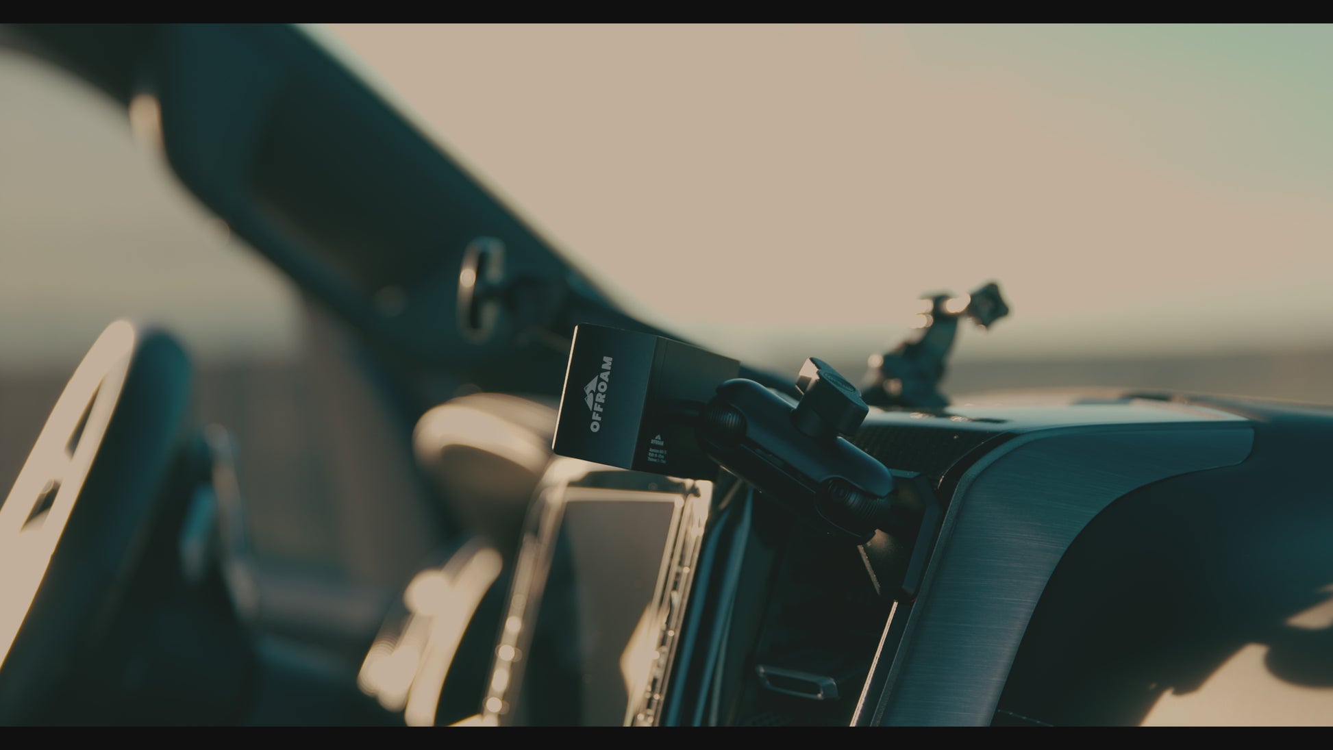 Video of Offroam Phone Mount installed securely in Ram 1500/2500/3500 2019-2025. This premium phone mount installs easily without drilling or glue. Spring loaded Universal holder for use with any phone. Perfect placement without blocking screens, driver view, or air flow. Fully adjustable positioning.