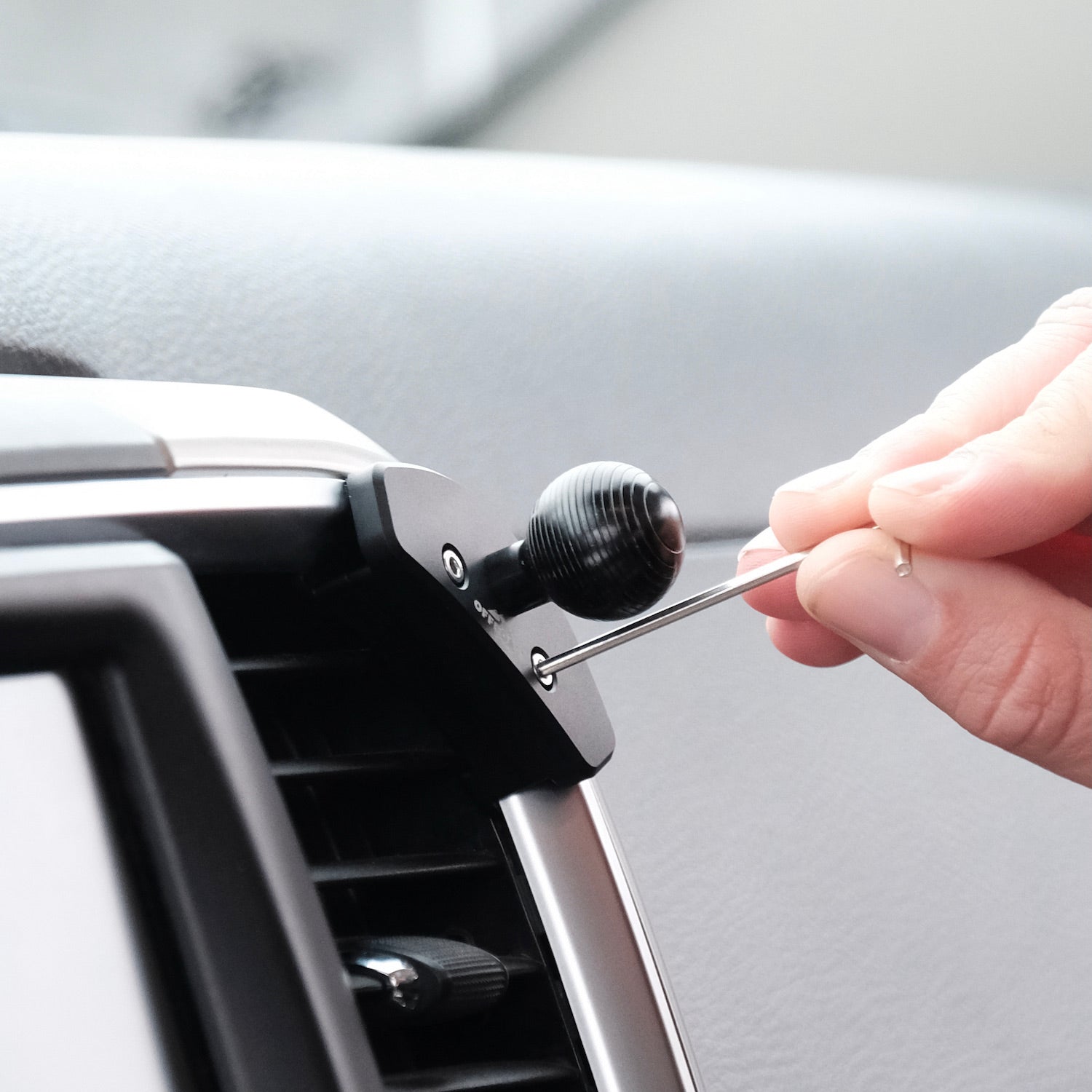 Image of Offroam Mounting Base installed securely in Ram 1500/2500/3500 2013-2018 & Ram Classic 2019-2024. This premium all metal phone mounting base installs easily without drilling or glue. Perfect placement without blocking screens, driver view, or air flow.