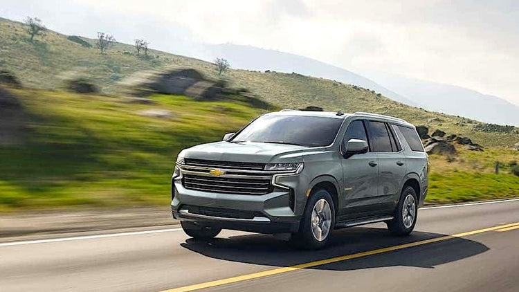 Image of Chevrolet Tahoe 2021-2024 on a highway.