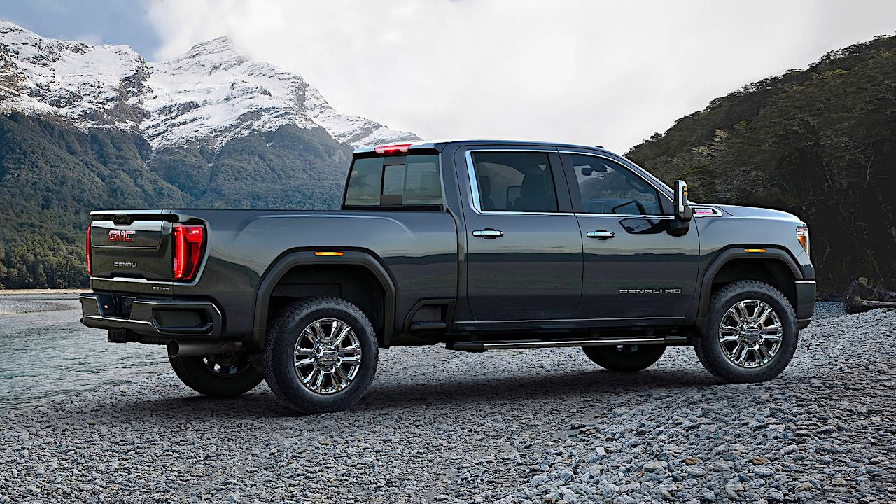 Image of GMC Sierra 2500 HD 2020-2023 on a mountain road.