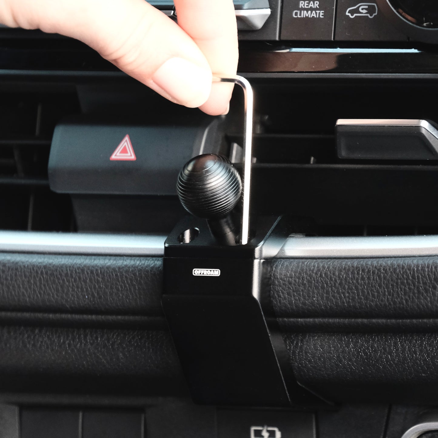 Image of Offroam Mounting Base installation in Toyota Grand Highlander 2024-2026. This premium all metal phone mounting base installs easily without drilling or glue. Perfect placement without blocking screens, driver view, or air flow.