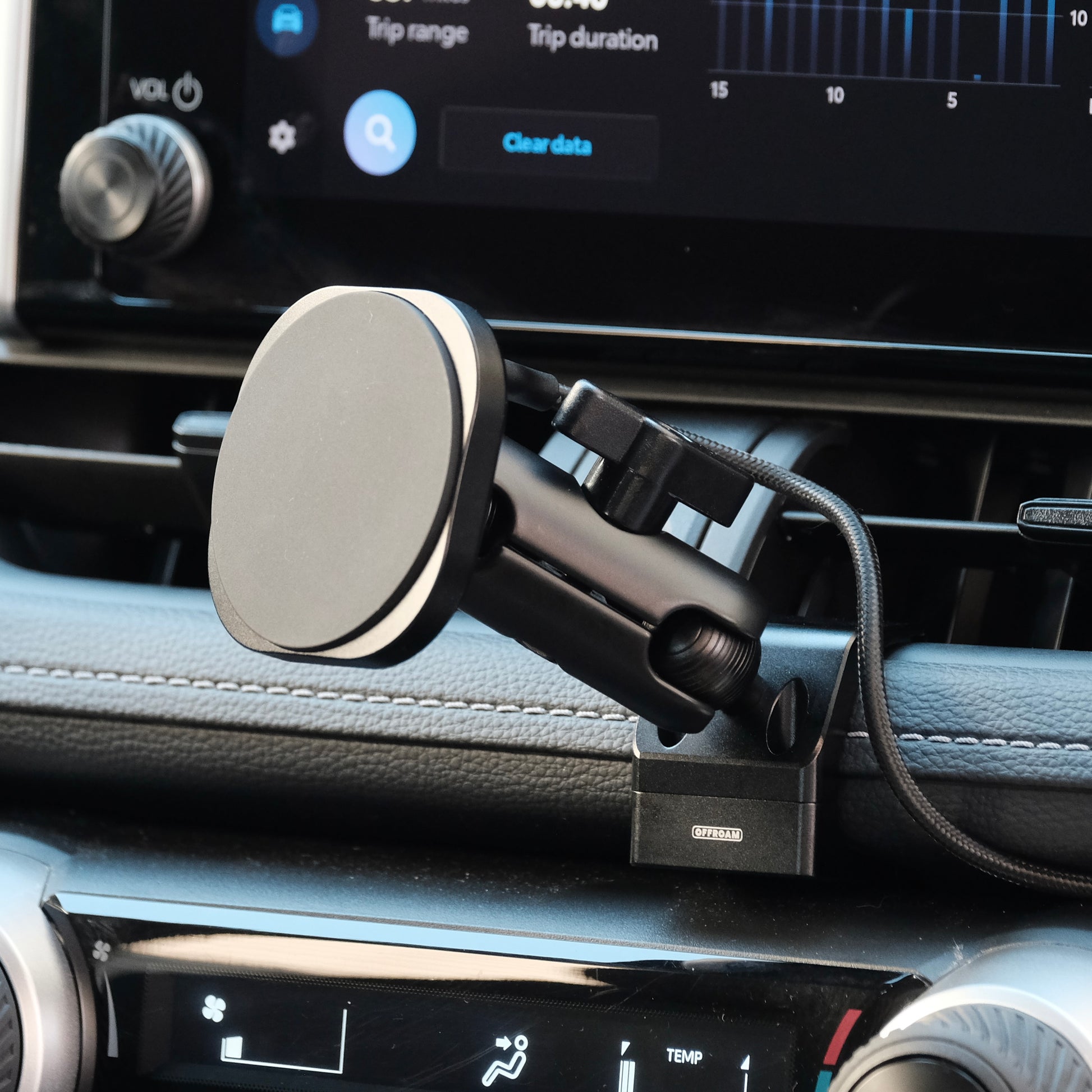 Image of Offroam MagSafe-compatible Phone Mount installed securely in Toyota RAV4 2019-2025. This premium phone mount installs easily without drilling or glue. High force magnets hold phone on any trail, road, or track. Perfect placement without blocking screens, driver view, or air flow. Fully adjustable positioning.