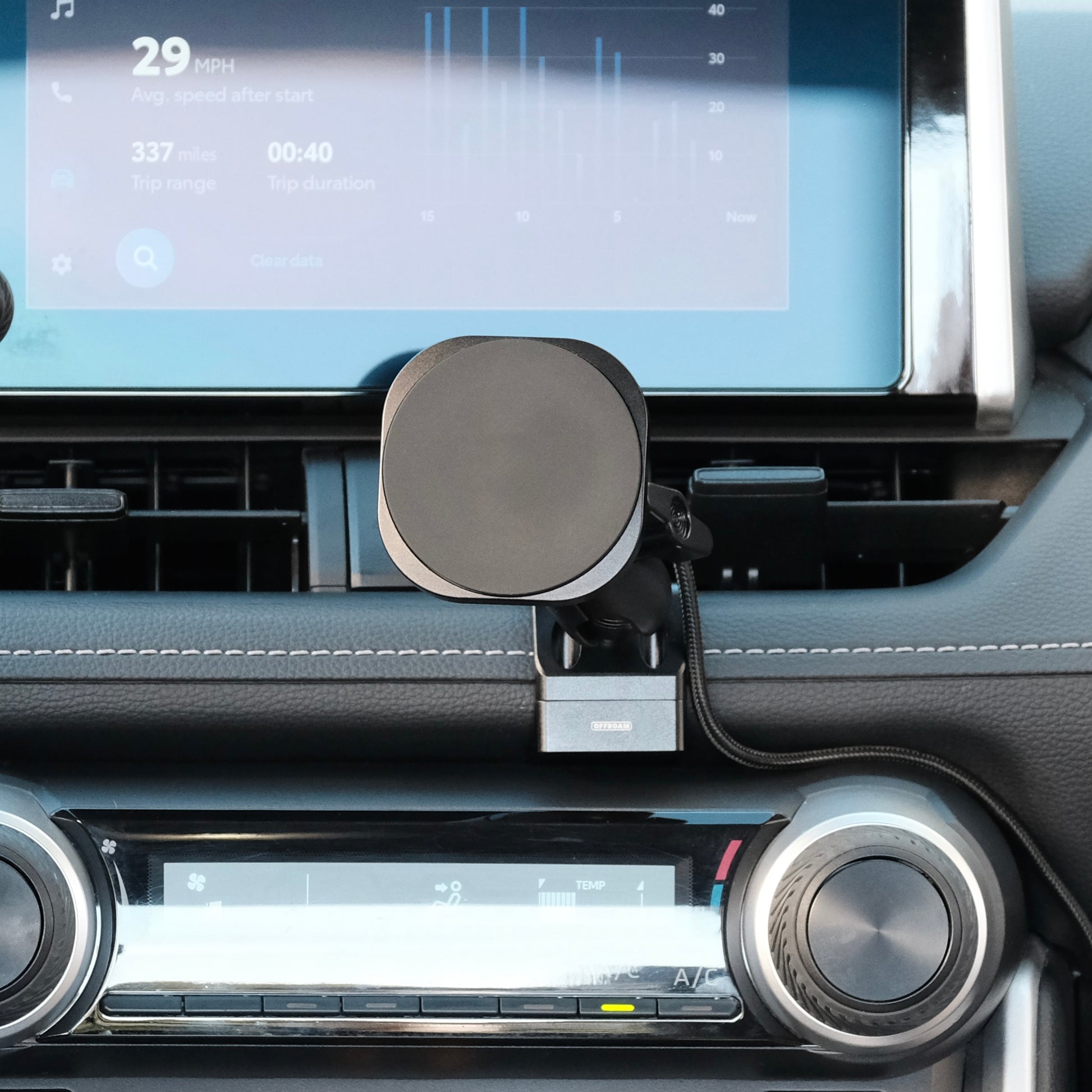 Image of Offroam MagSafe-compatible Phone Mount installed securely in Toyota RAV4 2019-2025. This premium phone mount installs easily without drilling or glue. High force magnets hold phone on any trail, road, or track. Perfect placement without blocking screens, driver view, or air flow. Fully adjustable positioning.