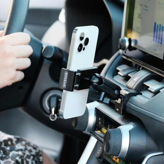 Image of Offroam Phone Mount installed securely in Toyota RAV4 2019-2025. This premium phone mount installs easily without drilling or glue. Spring loaded Universal holder for use with any phone. Perfect placement without blocking screens, driver view, or air flow. Fully adjustable positioning.