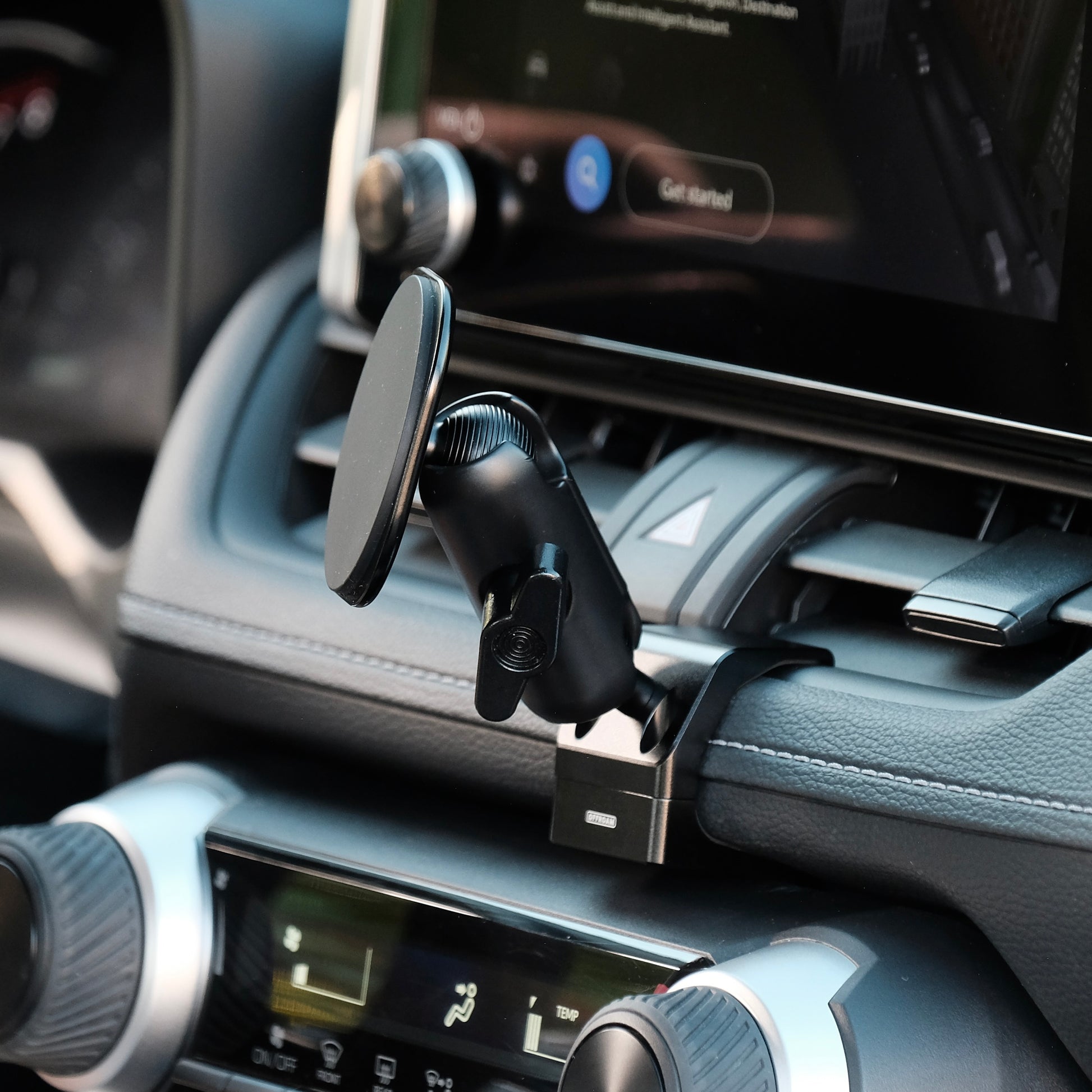 Image of Offroam MagSafe-compatible Phone Mount installed securely in Toyota RAV4 2019-2025. This premium phone mount installs easily without drilling or glue. High force magnets hold phone on any trail, road, or track. Perfect placement without blocking screens, driver view, or air flow. Fully adjustable positioning.