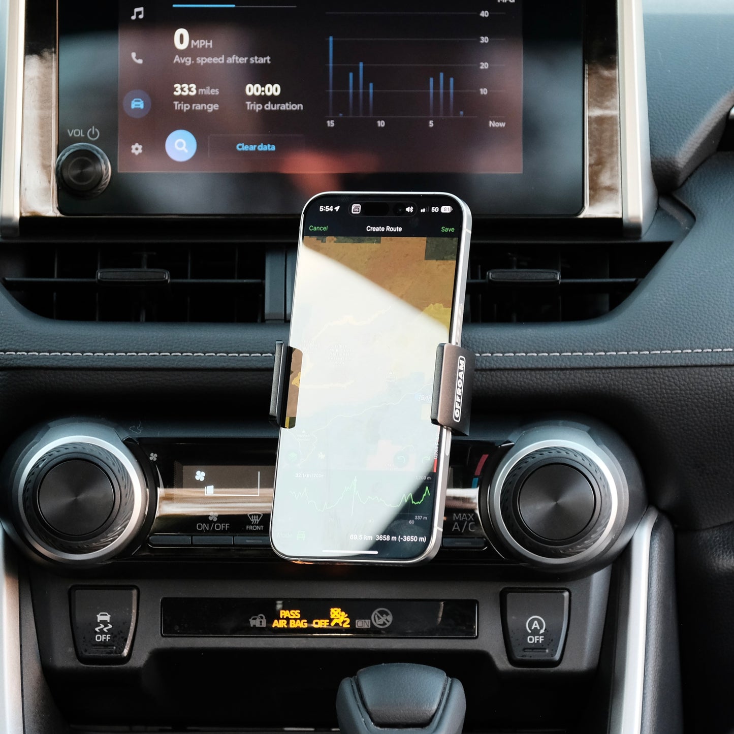 Image of Offroam Phone Mount installed securely in Toyota RAV4 2019-2025. This premium phone mount installs easily without drilling or glue. Spring loaded Universal holder for use with any phone. Perfect placement without blocking screens, driver view, or air flow. Fully adjustable positioning.