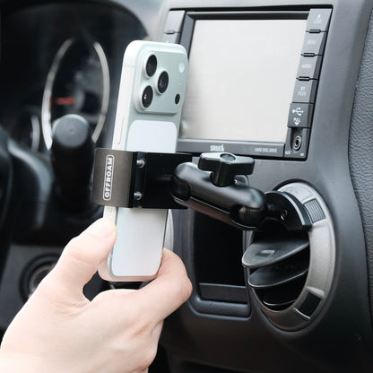 Offroam phone mount with 20mm ball shown installed in Jeep Wrangler JK 2011-2018 air vent bezel without blocking air flow holding the phone securely on off-road trails with mechanical strong force and one-hand docking & removal.