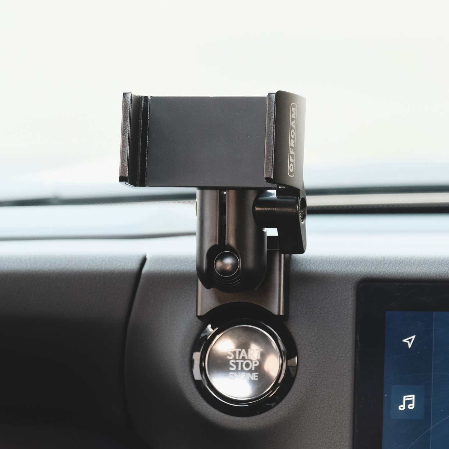 Image of Offroam MagSafe-compatible Phone Mount installed securely in Lexus GX 550 2024-2026. This premium phone mount installs easily without drilling or glue. High force magnets hold phone on any trail, road, or track. Perfect placement without blocking screens, driver view, or air flow. Fully adjustable positioning.