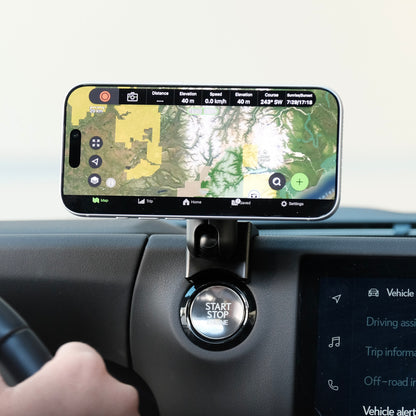 Image of Offroam MagSafe-compatible Phone Mount installed securely in Lexus GX 550 2024-2026. This premium phone mount installs easily without drilling or glue. High force magnets hold phone on any trail, road, or track. Perfect placement without blocking screens, driver view, or air flow. Fully adjustable positioning.