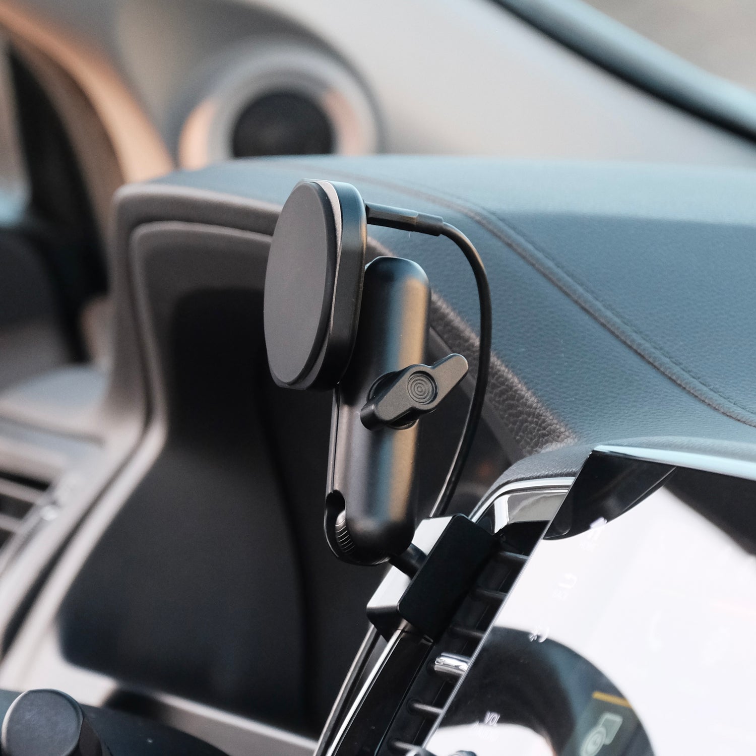 Image of Offroam MagSafe-compatible Phone Mount installed securely in Honda Ridgeline 2016-2025 | Passport 2019-2025 | Pilot 2016-2022. This premium phone mount installs easily without drilling or glue. High force magnets hold phone on any trail, road, or track. Perfect placement without blocking screens, driver view, or air flow. Fully adjustable positioning.