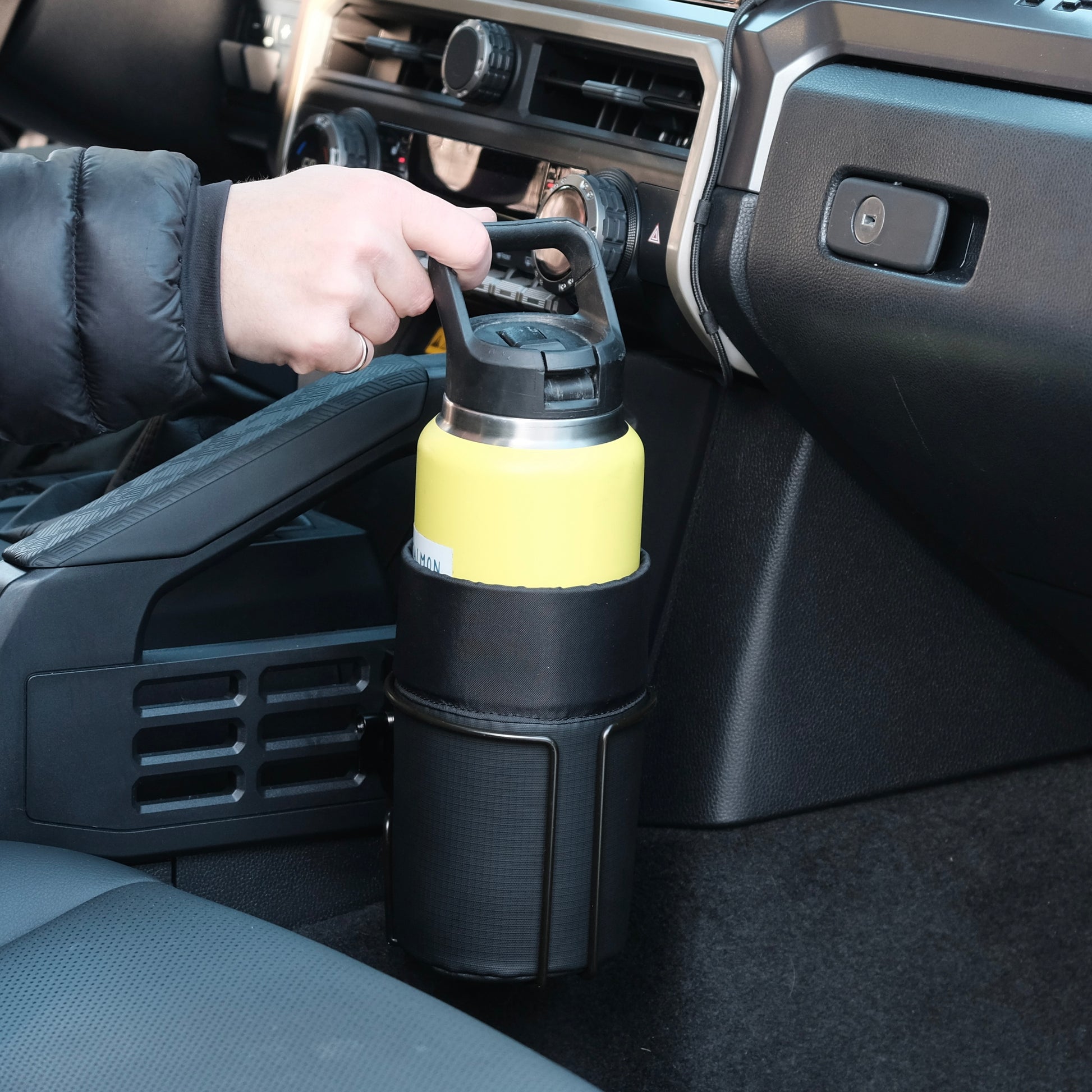 Image of Offroam Oversized Cup Holder installed securely in Toyota 4Runner 2025-2026 | Tacoma 2024-2026.