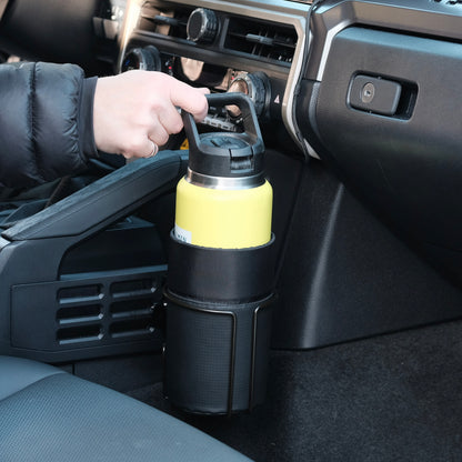 Image of Offroam Oversized Cup Holder installed securely in Toyota 4Runner 2025-2026 | Tacoma 2024-2026.