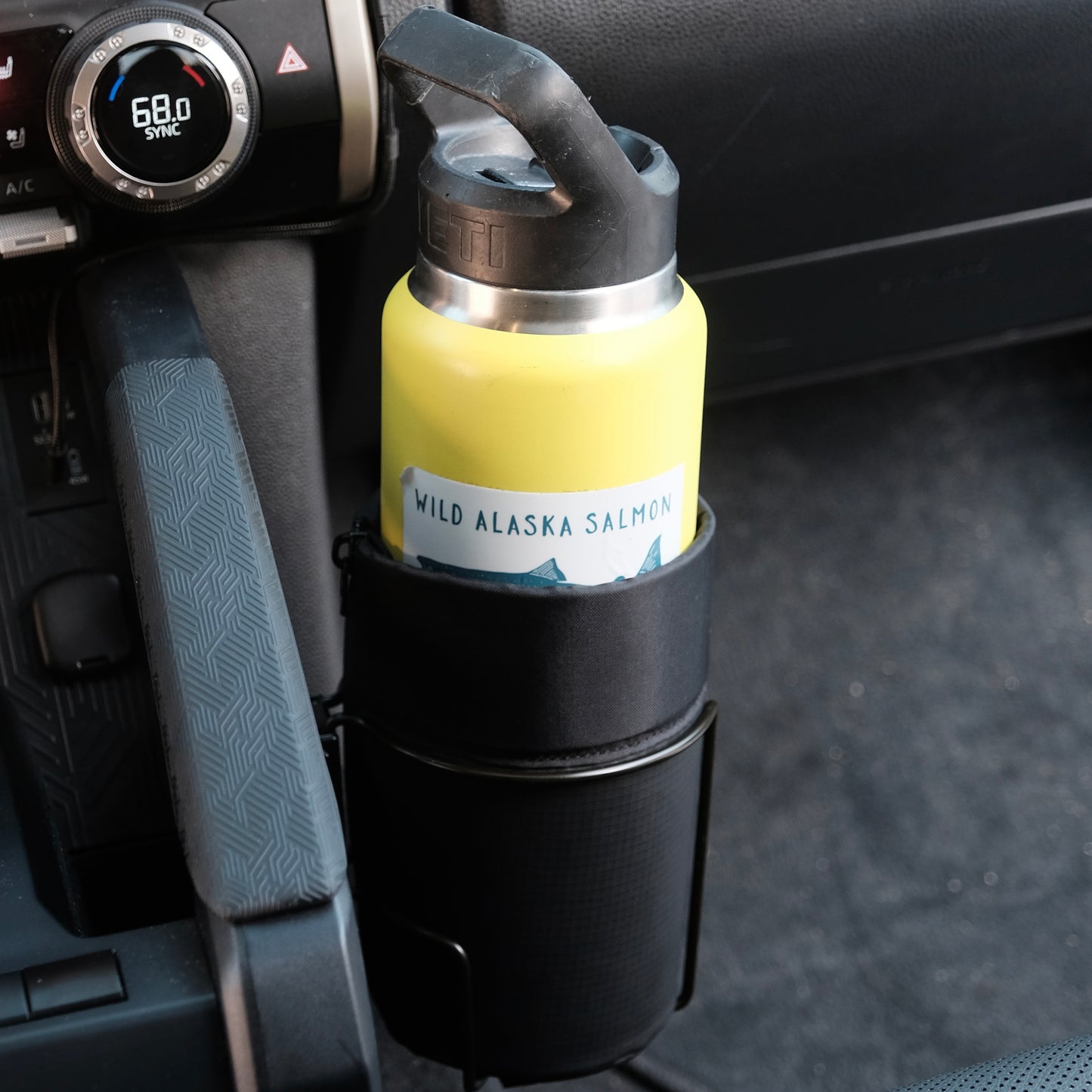 Image of Offroam Oversized Cup Holder installed securely in Toyota 4Runner 2025-2026 | Tacoma 2024-2026.