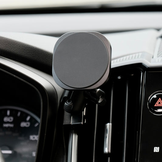 Image of Offroam MagSafe-compatible Phone Mount installed securely in Subaru Ascent 2023-2026. This premium phone mount installs easily without drilling or glue. High force magnets hold phone on any trail, road, or track. Perfect placement without blocking screens, driver view, or air flow. Fully adjustable positioning.