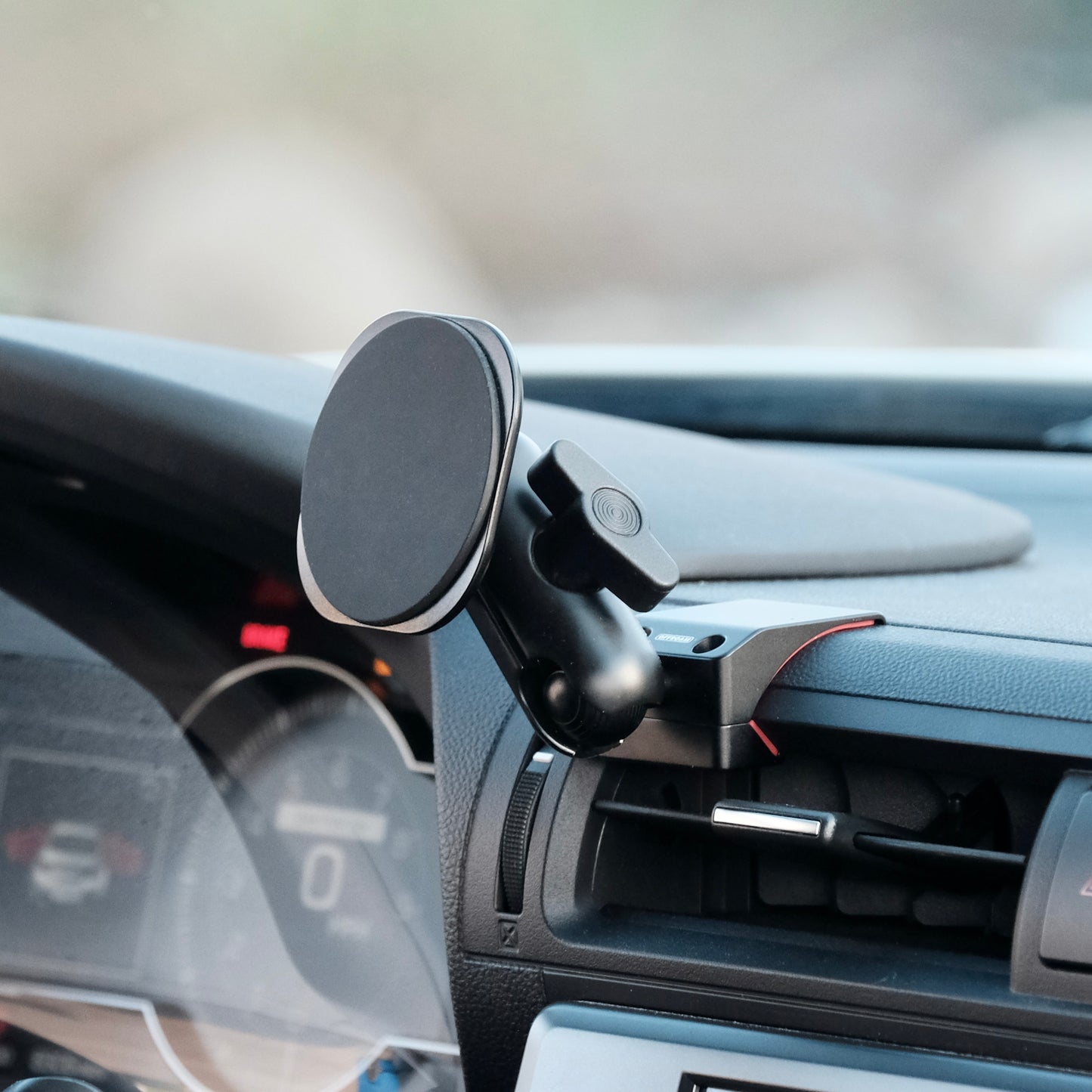 Offroam phone mount installed securely in Toyota GR86 or Subaru BRZ 2022-2025 near display screen is a premium accessory. Installs easily into existing features without drilling or glue. Perfect placement above air vent without blocking the screen, windshield or air flow. Fully adjustable positioning.