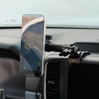 Image of Offroam MagSafe-compatible Phone Mount installed securely in Ford Ranger 2024-2025. This premium phone mount installs easily without drilling or glue. High force magnets hold phone on any trail, road, or track. Perfect placement without blocking screens, driver view, or air flow. Fully adjustable positioning.