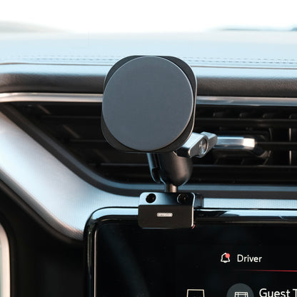 Image of Offroam MagSafe-compatible Phone Mount installed securely in GMC Sierra 1500 2022-2026 | Sierra HD 2024-2026  (AT4, AT4x, Denali, Denali Ultimate). This premium phone mount installs easily without drilling or glue. High force magnets hold phone on any trail, road, or track. Perfect placement without blocking screens, driver view, or air flow. Fully adjustable positioning.