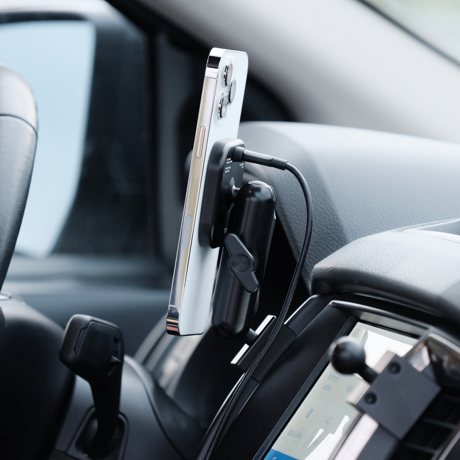 Image of Offroam MagSafe-compatible Phone Mount installed securely in Ford Ranger 2019-2023. This premium phone mount installs easily without drilling or glue. High force magnets hold phone on any trail, road, or track. Perfect placement without blocking screens, driver view, or air flow. Fully adjustable positioning.