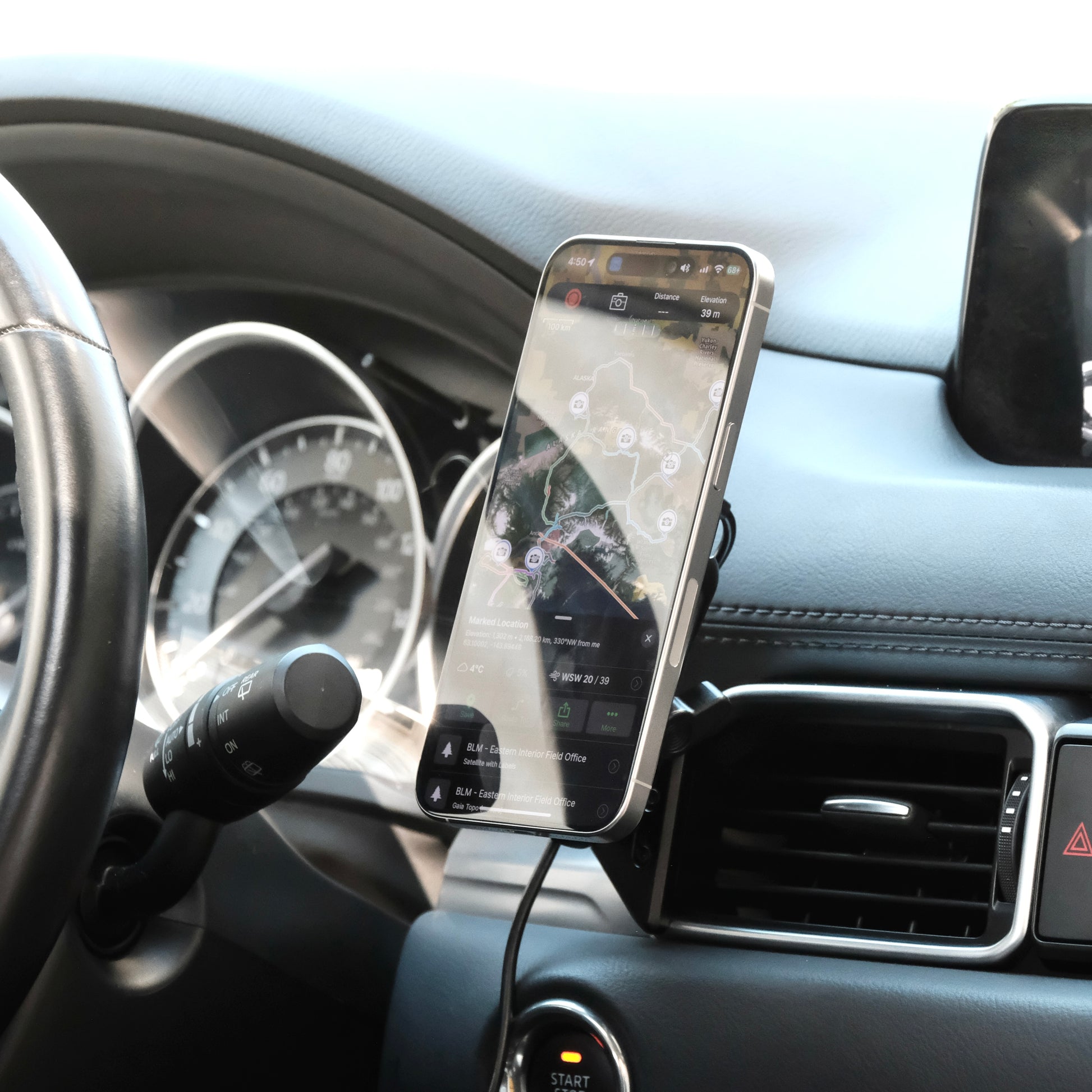 Image of Offroam MagSafe-compatible Phone Mount installed securely in Mazda CX-5 2017-2025. This premium phone mount installs easily without drilling or glue. High force magnets hold phone on any trail, road, or track. Perfect placement without blocking screens, driver view, or air flow. Fully adjustable positioning.