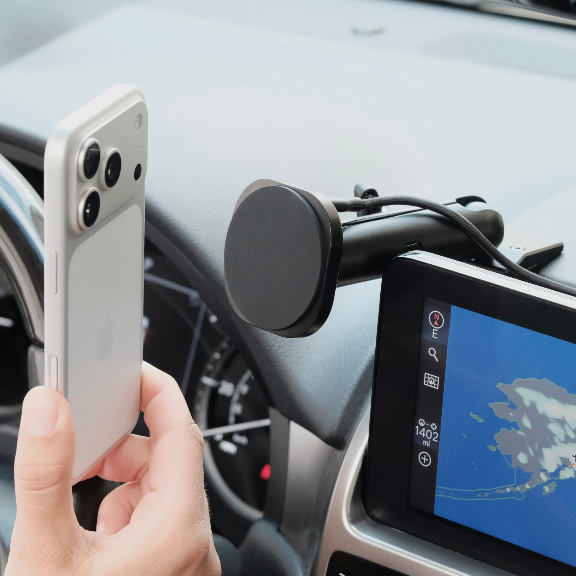Image of Offroam MagSafe-compatible Phone Mount installed securely in Lexus GX 460 2022-2023. This premium phone mount installs easily without drilling or glue. High force magnets hold phone on any trail, road, or track. Perfect placement without blocking screens, driver view, or air flow. Fully adjustable positioning.