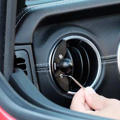 Image of Offroam Mounting Base installed securely in Jeep Wrangler 2018-2023 | Gladiator 2019-2023. This premium all metal phone mounting base installs easily without drilling or glue. Perfect placement without blocking screens, driver view, or air flow.