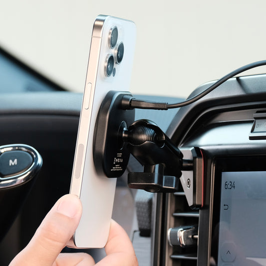 Image of Offroam MagSafe-compatible Phone Mount installed securely in Ford F-150 2021-2025 | F-250/F-350 2023-2025 | F-150 Lightning (XL & PRO) 2022-2025. This premium phone mount installs easily without drilling or glue. High force magnets hold phone on any trail, road, or track. Perfect placement without blocking screens, driver view, or air flow. Fully adjustable positioning.