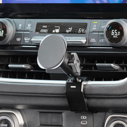 Image of Offroam MagSafe-compatible Phone Mount installed securely in Toyota Grand Highlander 2024-2026. This premium phone mount installs easily without drilling or glue. High force magnets hold phone on any trail, road, or track. Perfect placement without blocking screens, driver view, or air flow. Fully adjustable positioning.